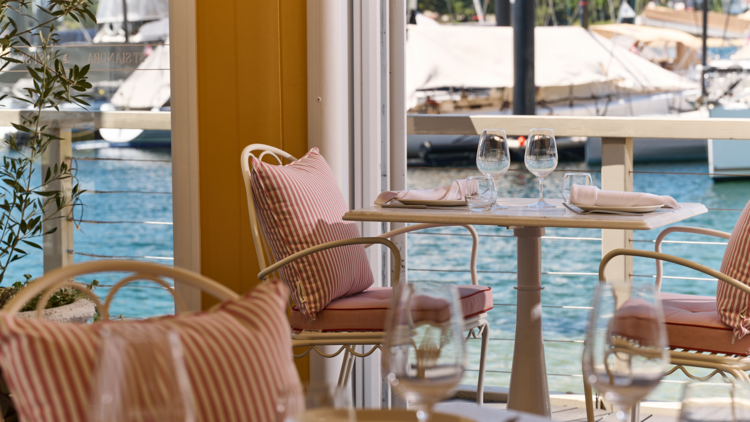 Restaurant tables overlooking the water 