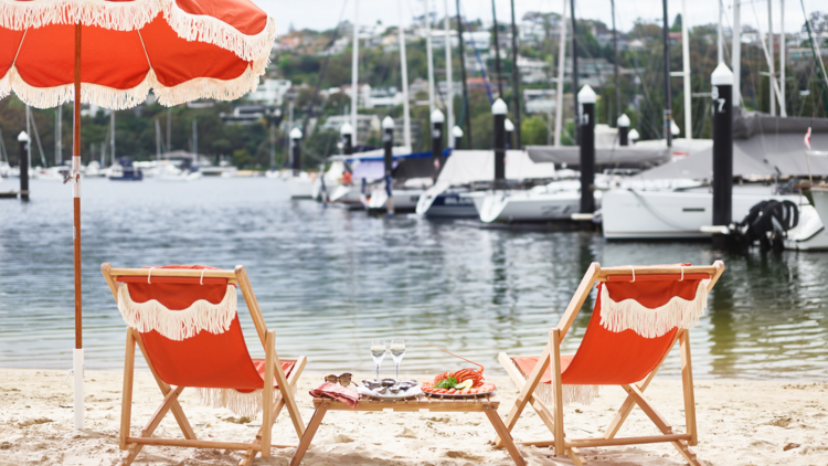 Beach chairs and seafood by the water