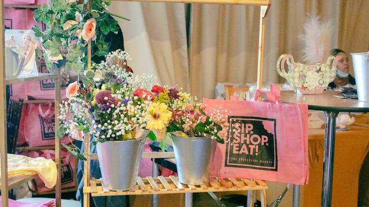 Flowers and a pink tote bag