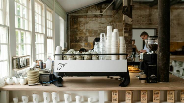 White barista machine in historic cafe 