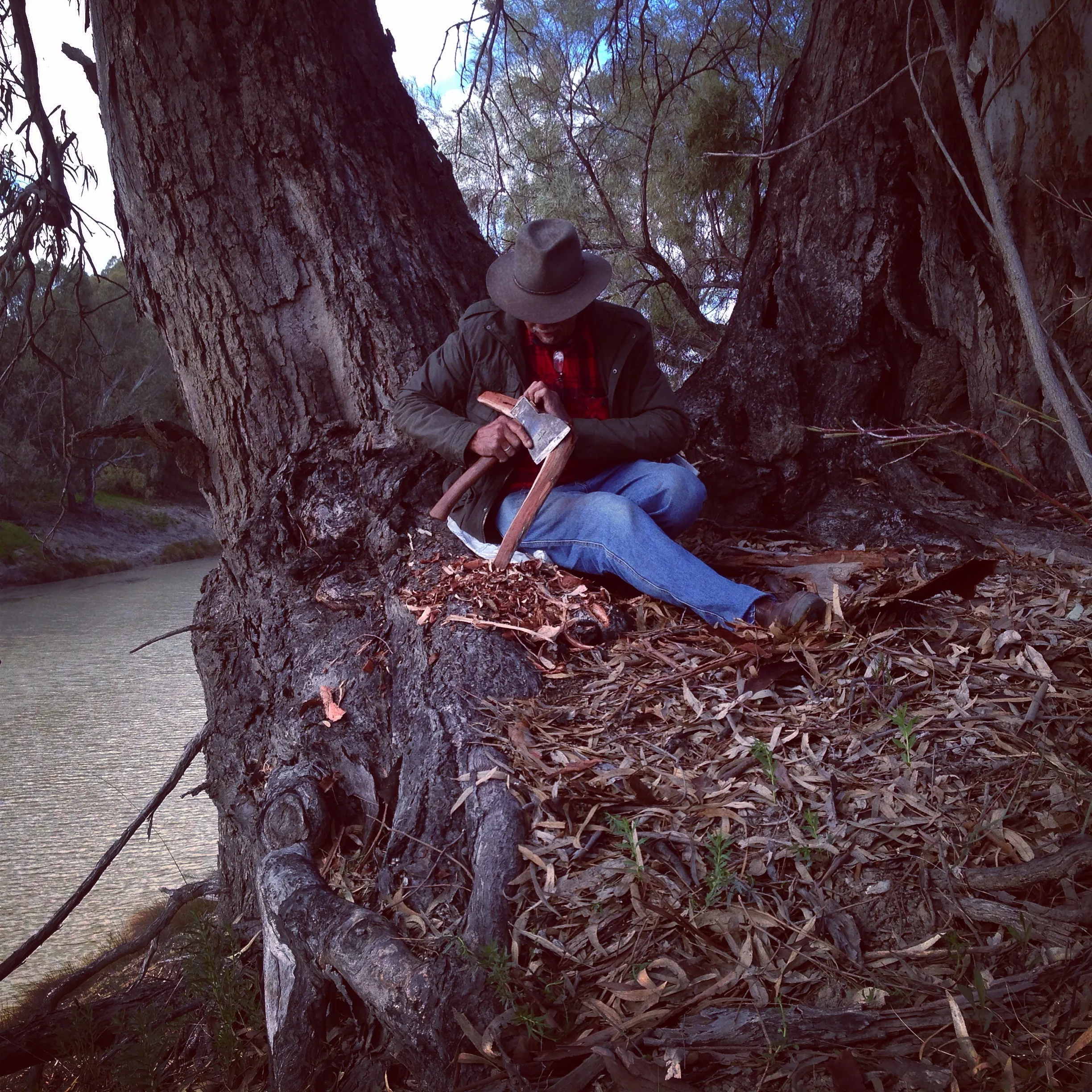 Uncle Badger Bates calving a boomerang on the Banks of the Barka