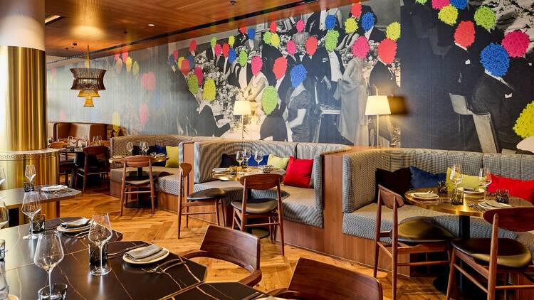 Ms Parker restaurant at The Motley Hotel, with cosy booths and a colourful mural.