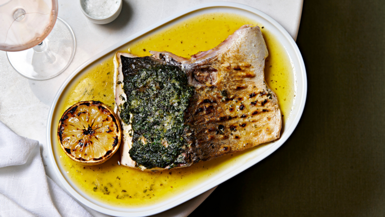 Whole flounder with grilled lemon and herb butter