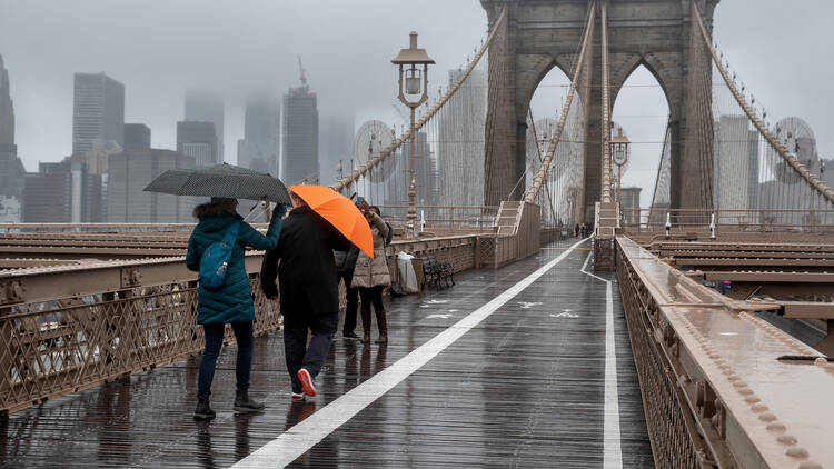 The Brooklyn Bridge on a rainy day.