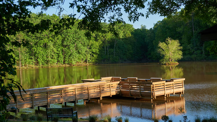 Fishing dock on the lake at Anne Springs Close Greenway in Fort Mill, South Carolina. 