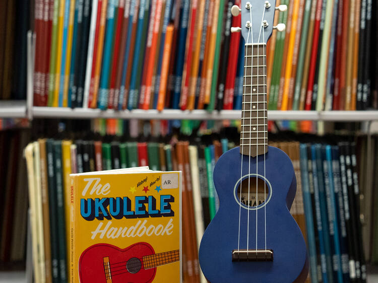 Pick up and play a ukulele.