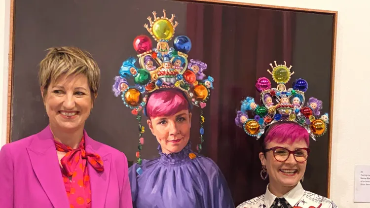 Artist Andrea Huelin and sitter Cal Wilson with 'Clown jewels'
