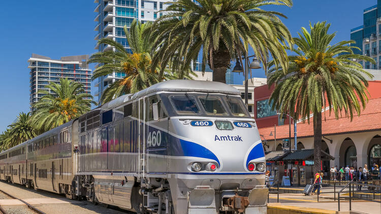 Amtrak train arriving at Santa Fe Depot in downtown San Diego.