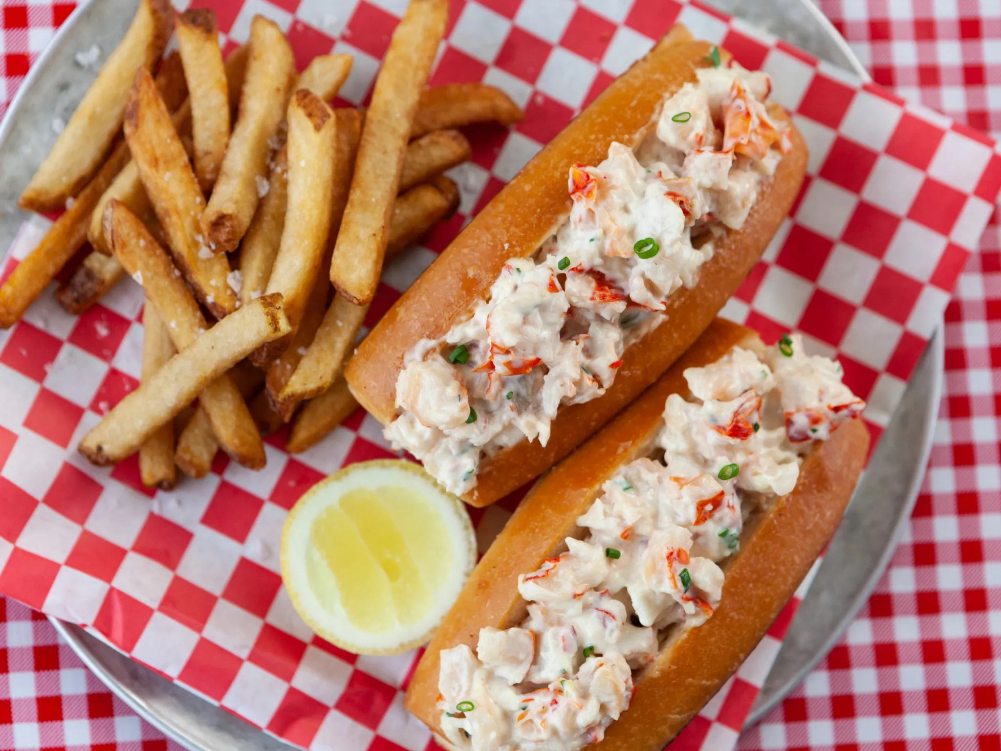 A lobster roll with chips'
