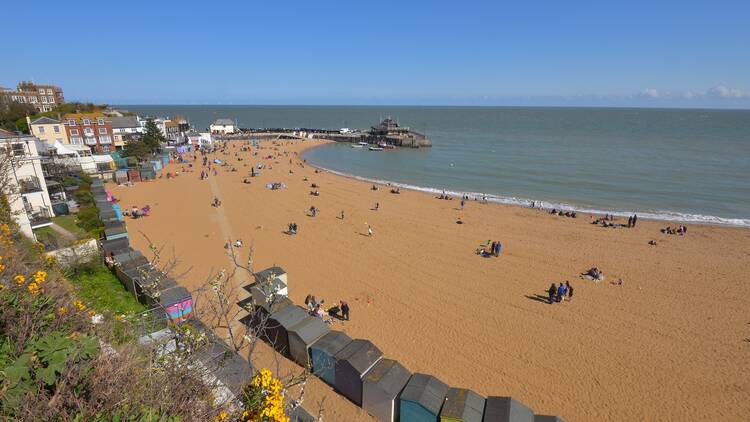 A beach with a blue sky 