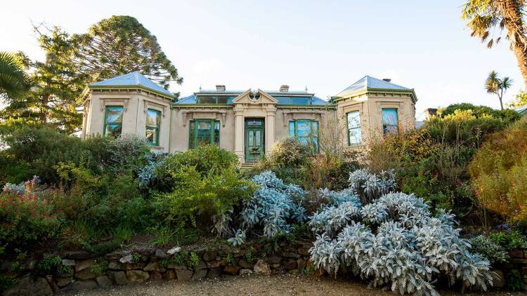 An impressive historic house amid lush gardens