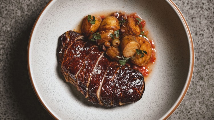 Smoked duck breast with tomato dashi and muntries