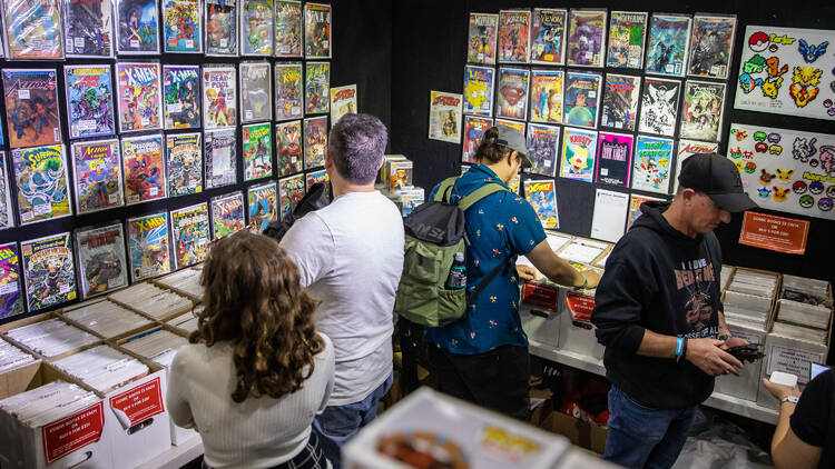 People browsing comic books at Oz Comic-Con.
