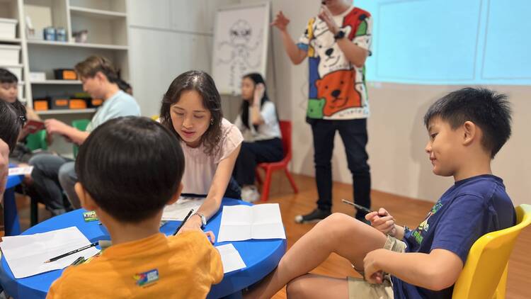 A comic art workshop held at the Children's Museum