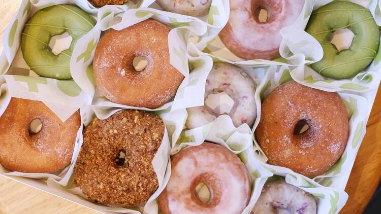 Box of multicoloured donuts.