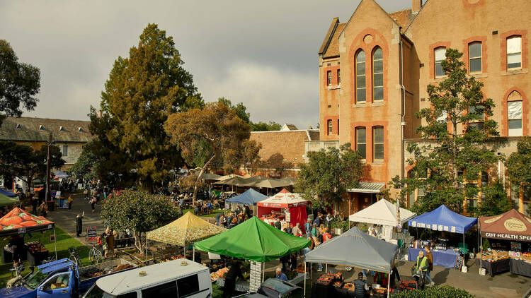 An outdoor farmers market at Abbotsford Convent.