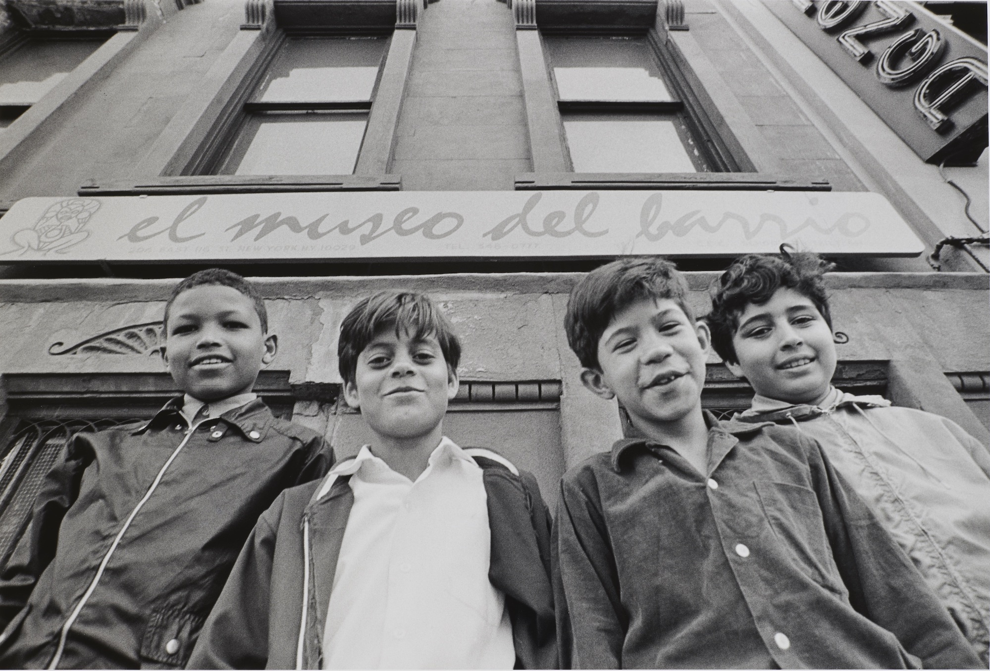 Four children outside of El Museo del Barrio, P.S. 206, 508 East 120th Street, New York City.