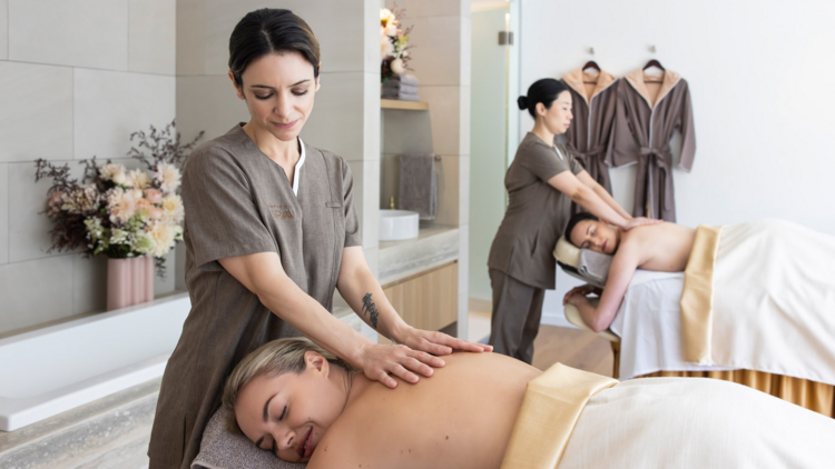 Two women getting massages