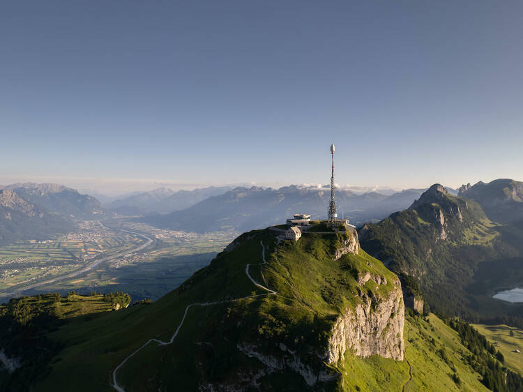 Eat at a revolving restaurant on top of a mountain