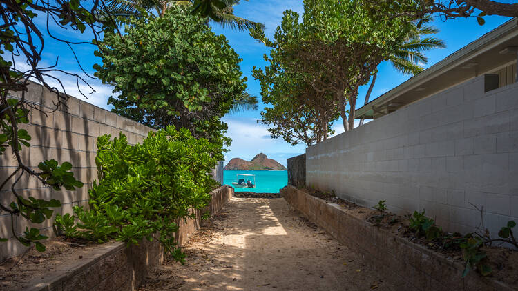 The island at the end of the tunnel - photo captured from Lanikai Beach, in Kailua, Hawaii, at one of the many public access walkways to the beach and ocean.