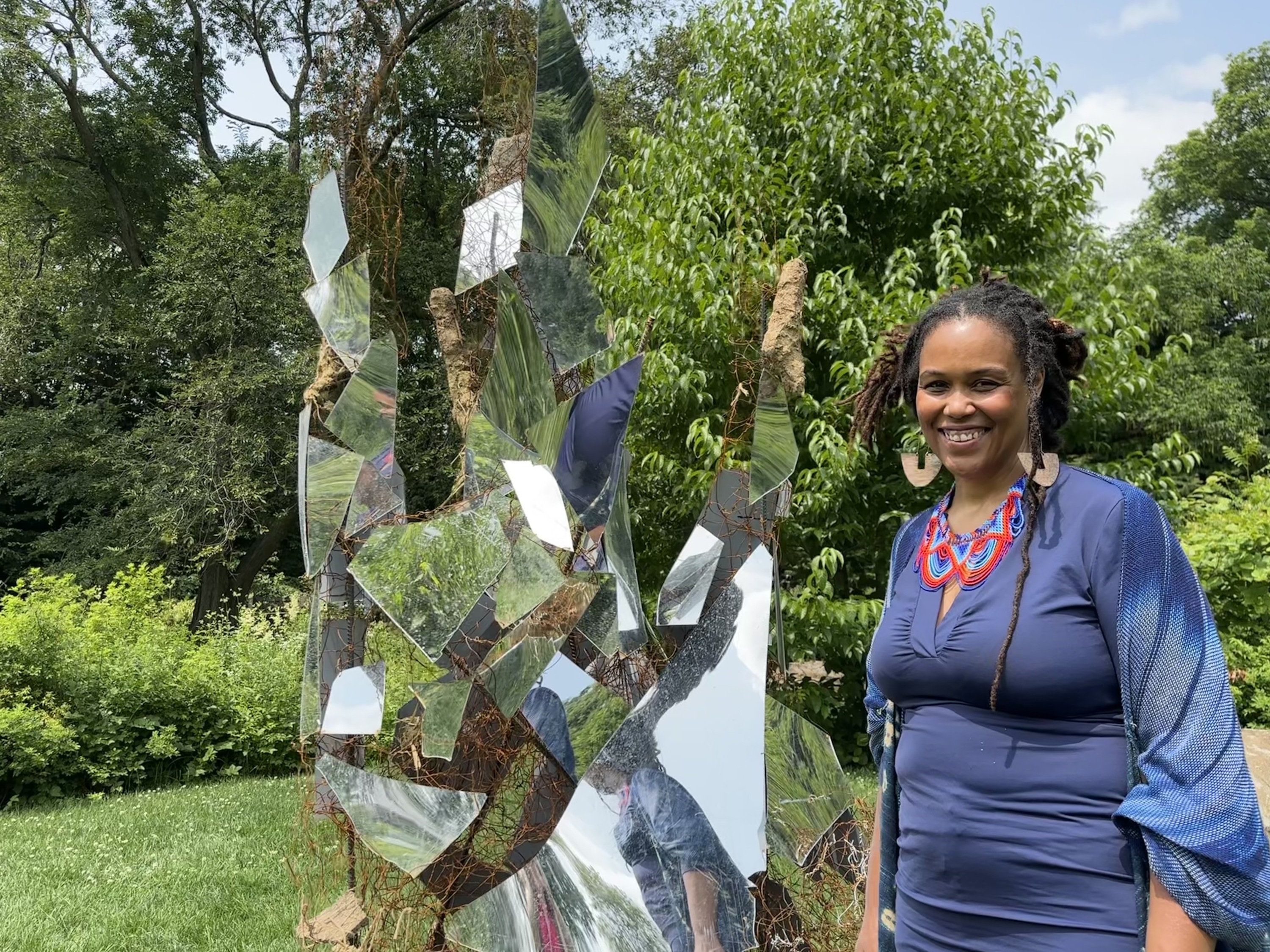 Jasmine Murrell poses with her sculpture.