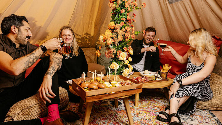 Friends enjoying glamping experience at the Winery