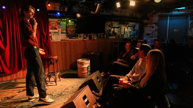 A comedian performs at the Espy