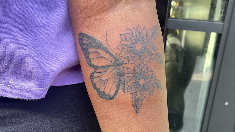 Butterfly flower tattoo (Victory Tattoo NYC)