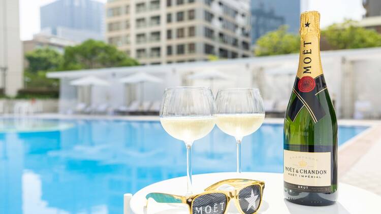 Summer Beach Club with Moët & Chandon by the skyline