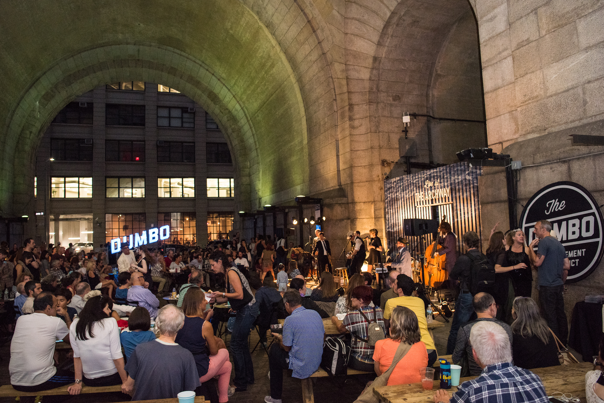 Find live music and exciting art under Dumbo's iconic archway this summer