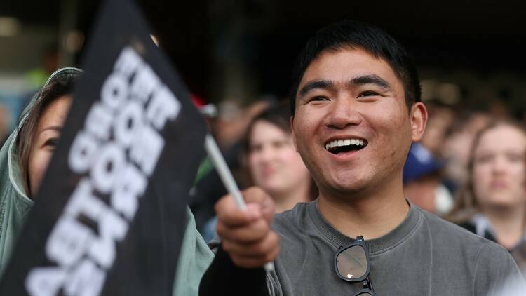 A man cheering at the FIFA Womens World Cup 2023