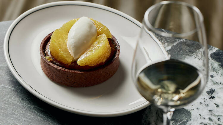 Mandarin tart with paired glass of wine.