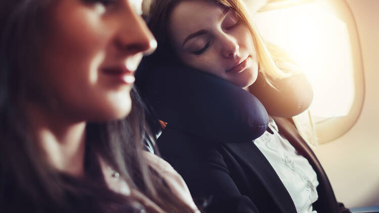 People sleeping on plane