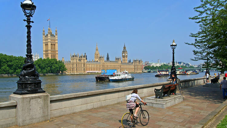 Cyclist next to the River Thames
