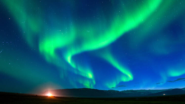 Aurora borealis (northern lights) in the night sky