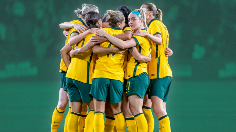 The Matildas women's football team in a huddle