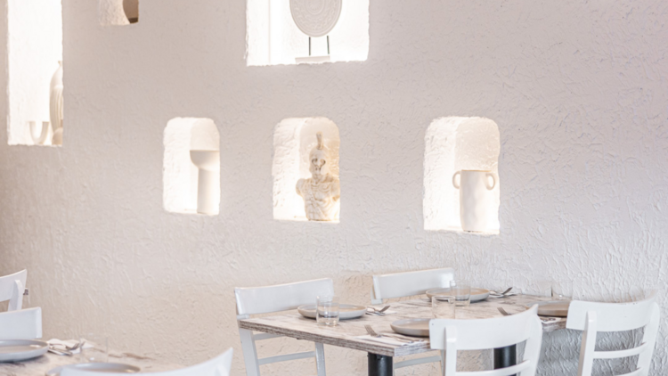 A white, Greek-style restaurant.
