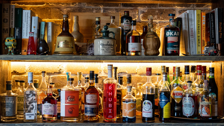 A bar stocked with alcohol