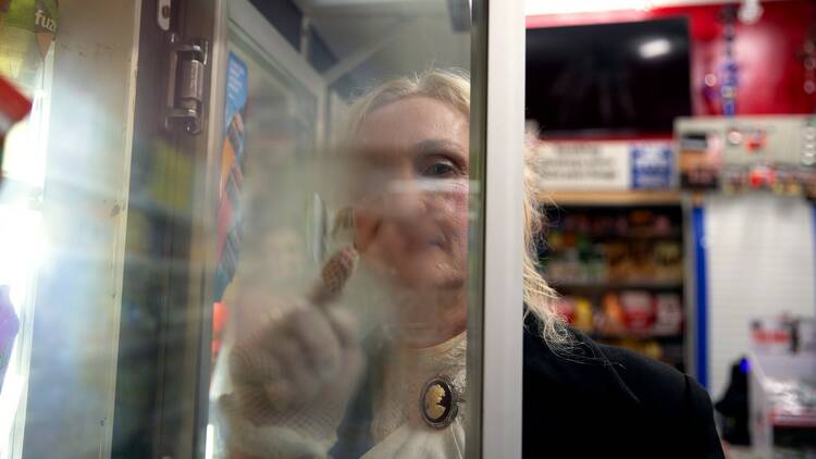 A woman in a laundromat