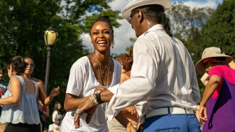 People dance in Central Park.