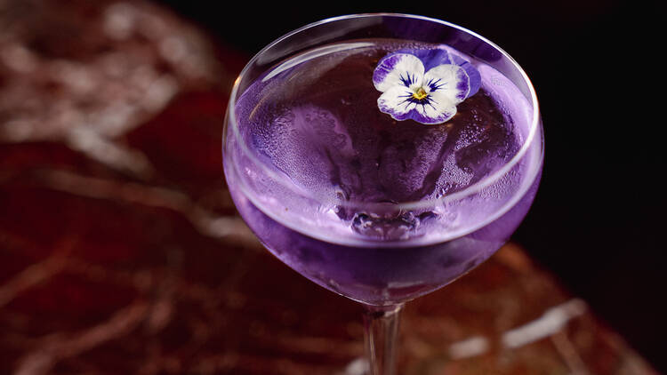 A purple cocktail at Cardea