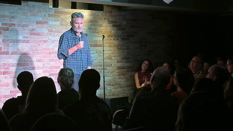 pic of dave hughes performing at the basement comedy club