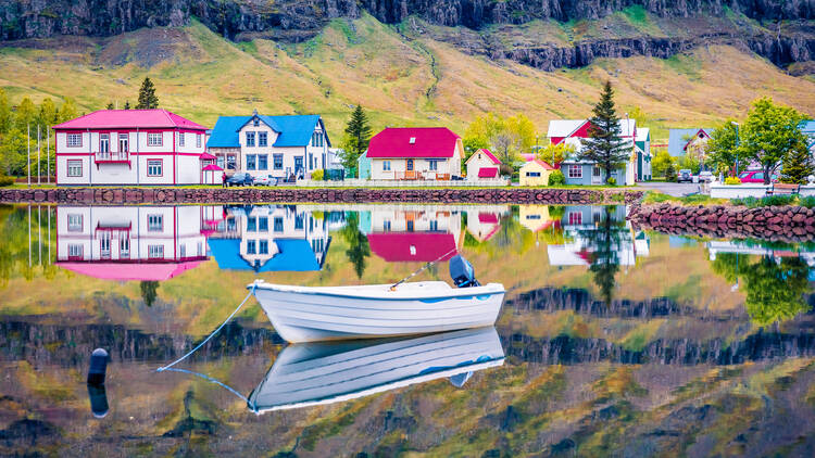 Colorful morning cityscape of small fishing town - Seydisfjordur, Iceland.