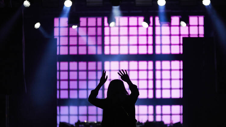 picture of a woman partying pink and black lights