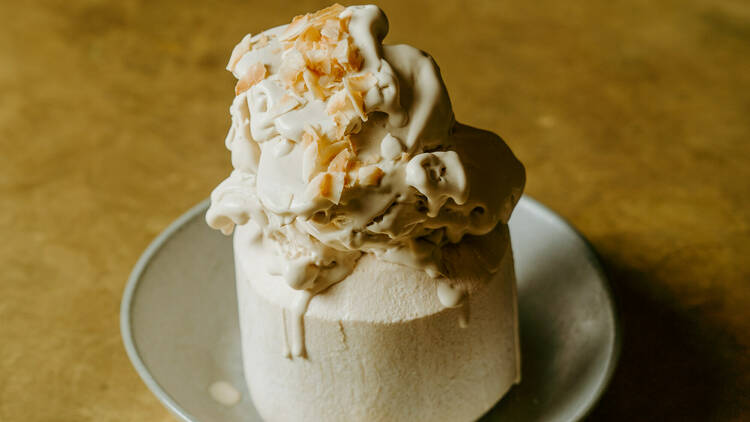 A Pan-Asian dessert served in a coconut.