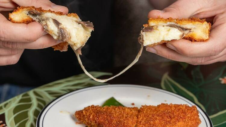 The cheese and anchovy deep fried sandwich at Tucano’s