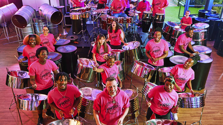 A steel band looking up at the camera 