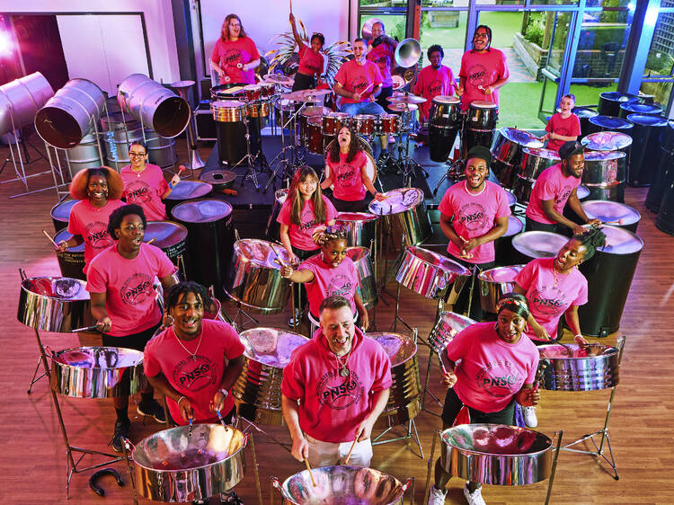 A steel band looking up at the camera 