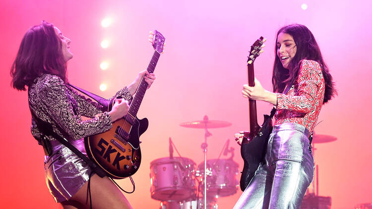 Haim performing on stage