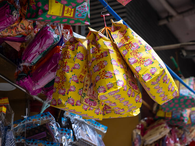 Why do people burn paper offerings during the Hungry Ghost Festival?